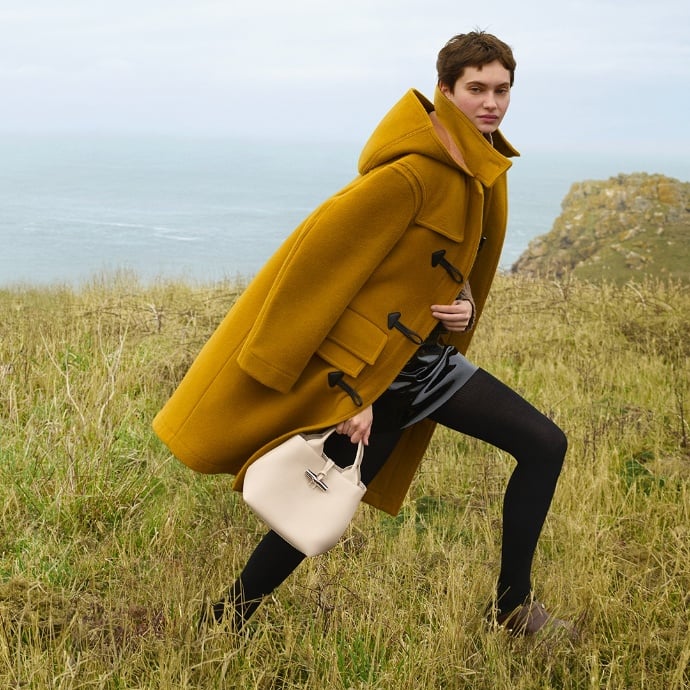 Image of a model with Longchamp bag